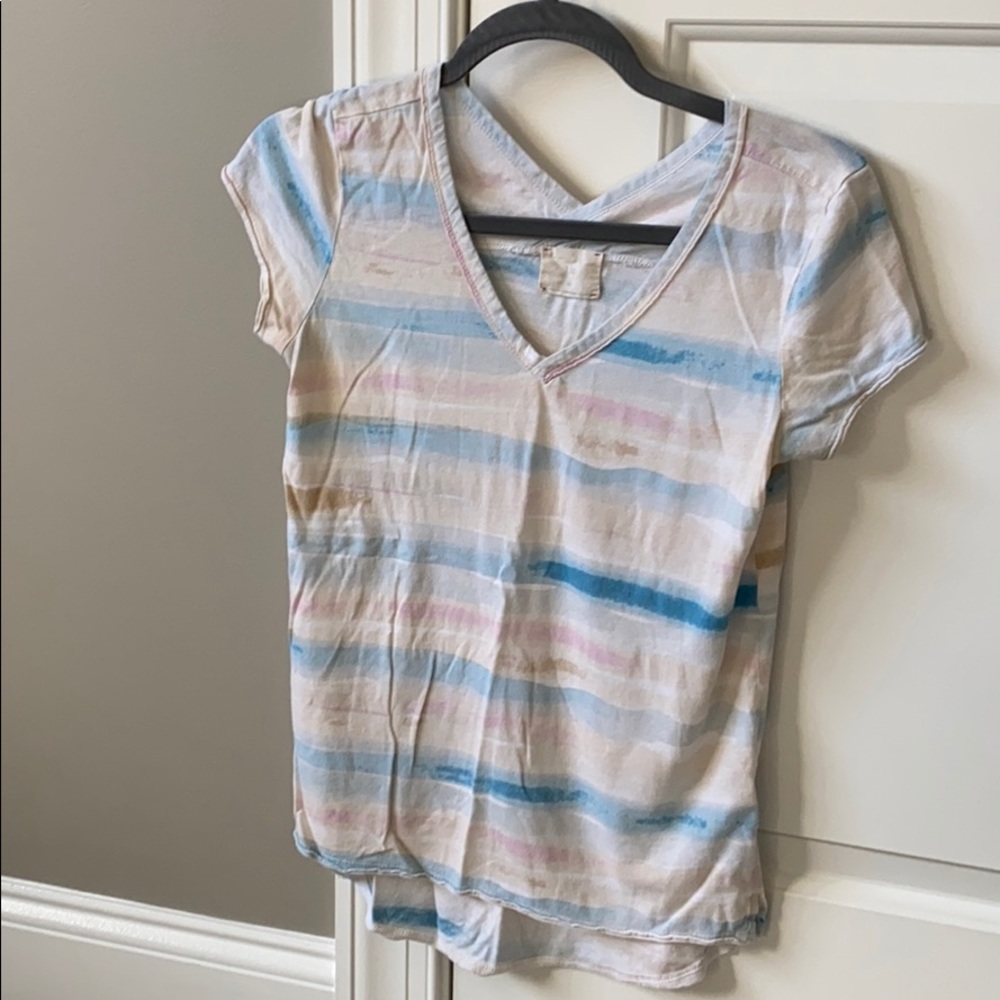 T.la t-shirt size XS.